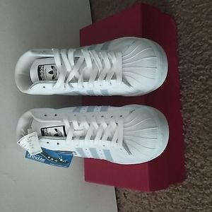 ADDIDAS Pro Model SIZE 6Y= 7/7.5 IN WOMEN